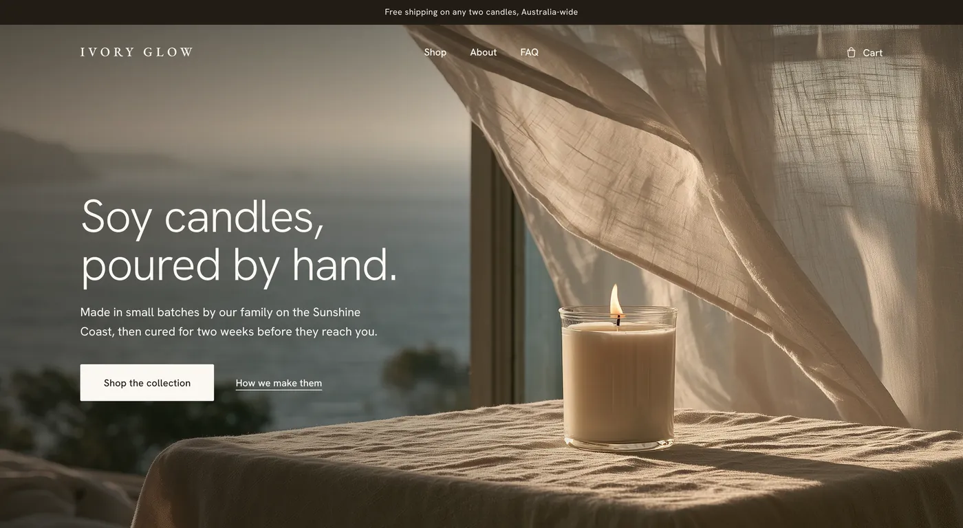 The Ivory Glow home page: a lit candle on a linen-covered table by a window, under the heading Soy candles, poured by hand.